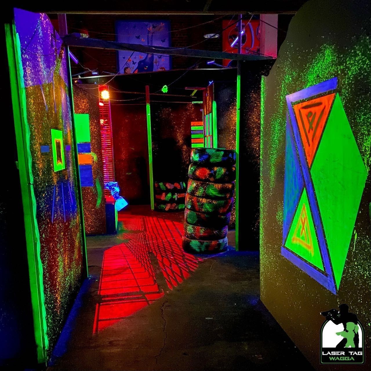 A Hallway With Glow In The Dark Paint On The Walls — Laser Tag Wagga In Wagga Wagga, NSW