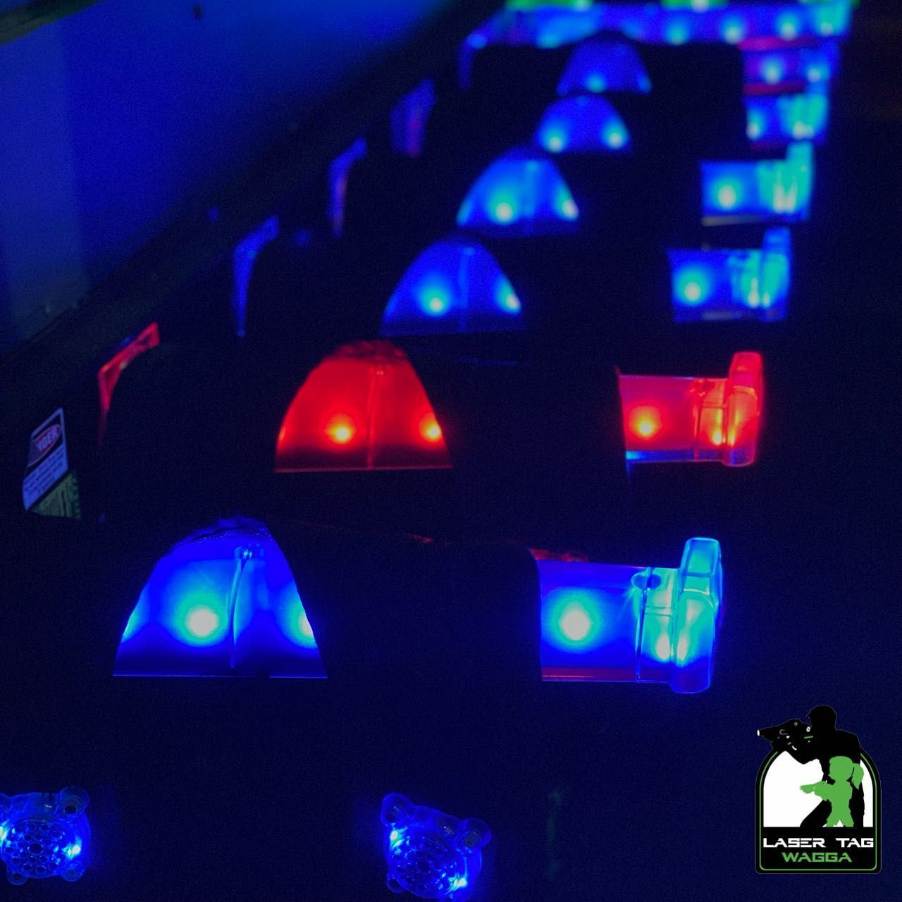 A Row Of Blue And Red Lights With The Words Laser Tag Visible — Laser Tag Wagga In Wagga Wagga, NSW
