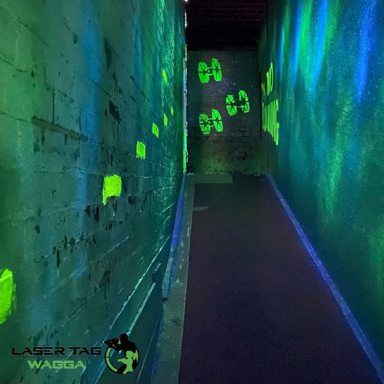 A Hallway With Glow In The Dark Letters On The Wall For Laser Tag — Laser Tag Wagga In Wagga Wagga, NSW