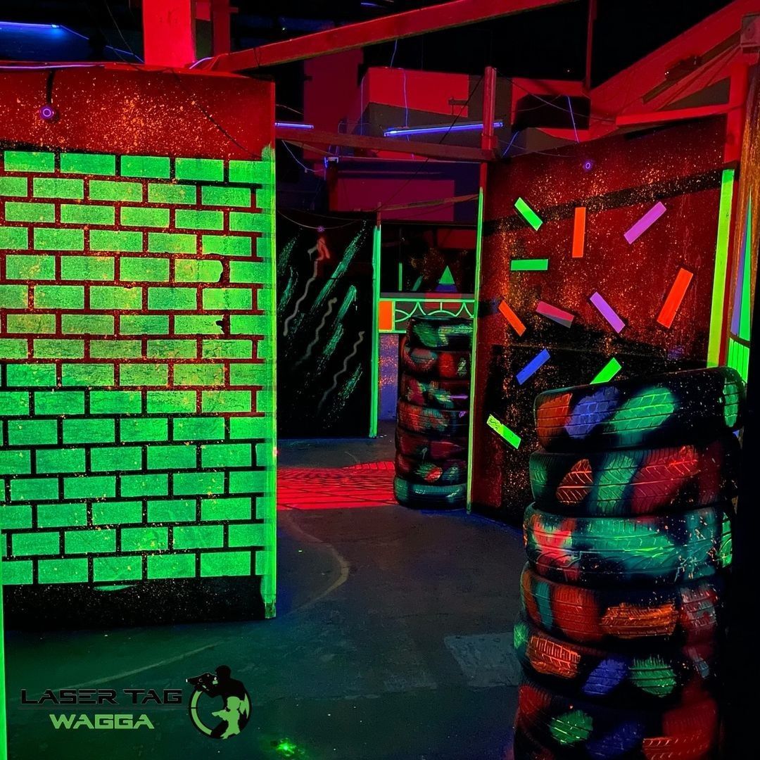 A Glow In The Dark Laser Tag Arena With Glow In The Dark Brick Walls — Laser Tag Wagga In Wagga Wagga, NSW