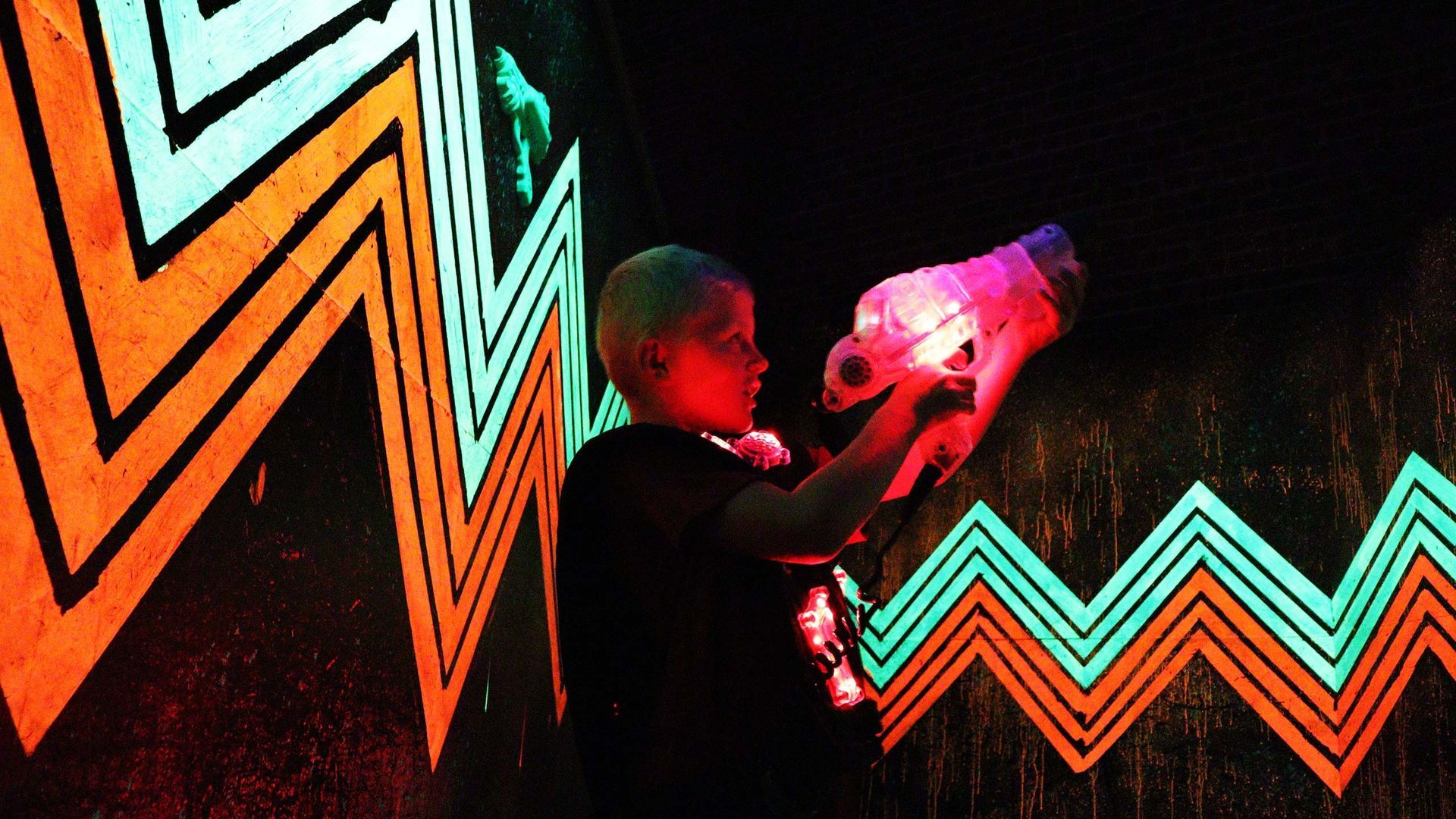 Kid Aiming In A Game Of Laser Tag — Laser Tag Wagga In Wagga Wagga, NSW