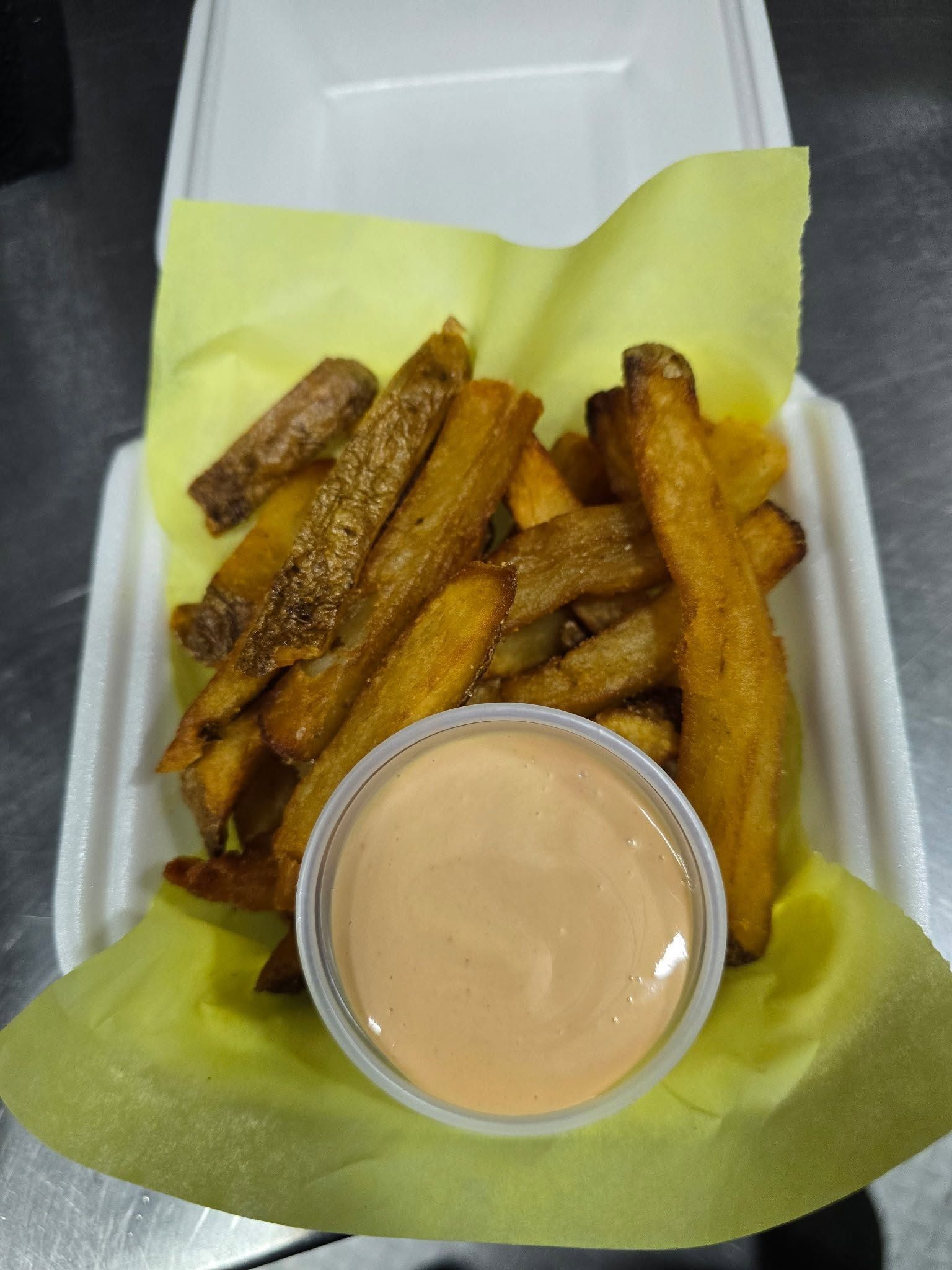 Fresh cut fries with dipping sauce
