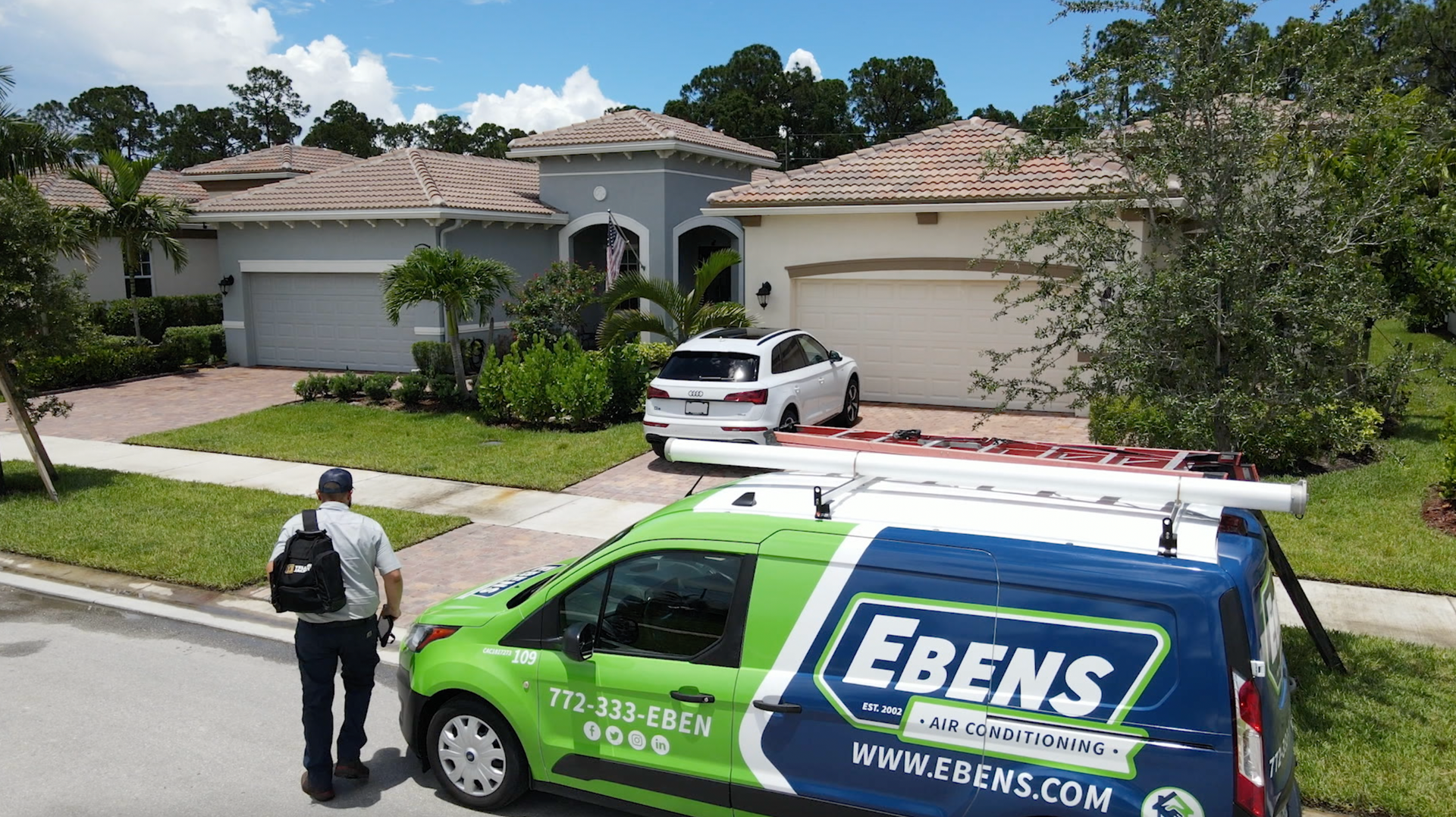 Ebens Air Conditioning Service Technician with his work truck.