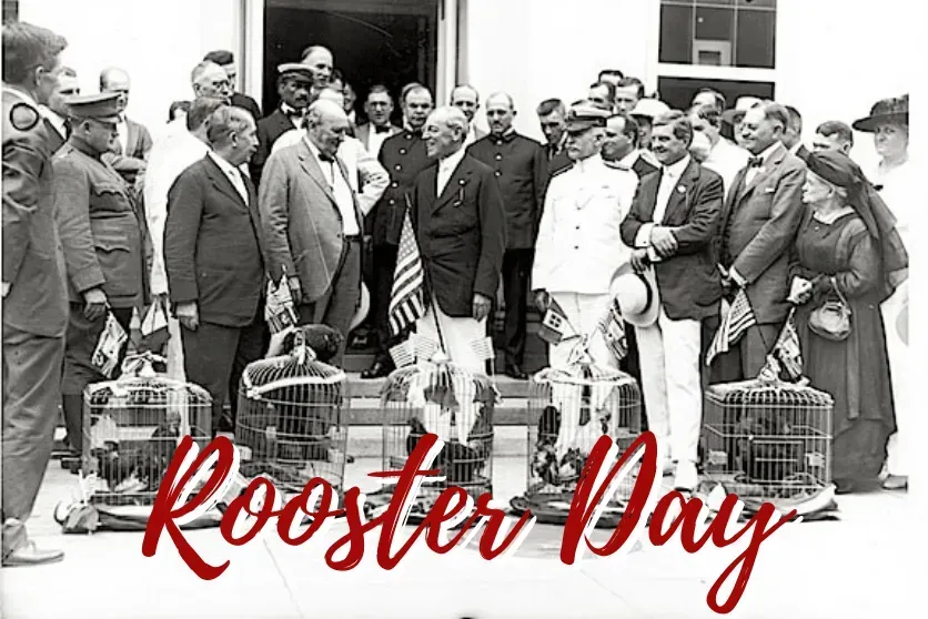 A group of people standing in front of a building with rooster day written on the bottom