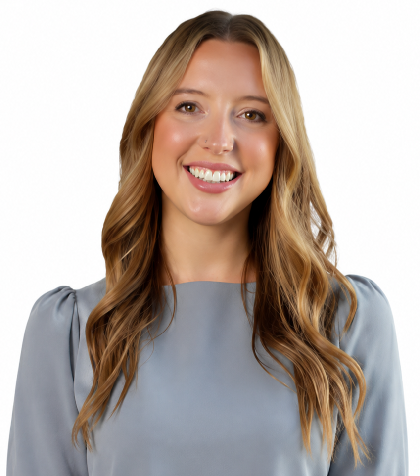 Smiling woman in a light blue blouse against a white background