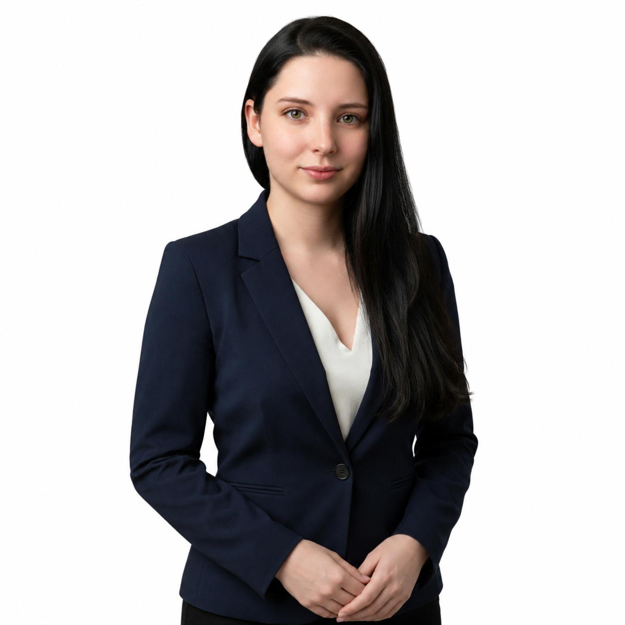 Woman in a navy blazer and white blouse standing against a white background.