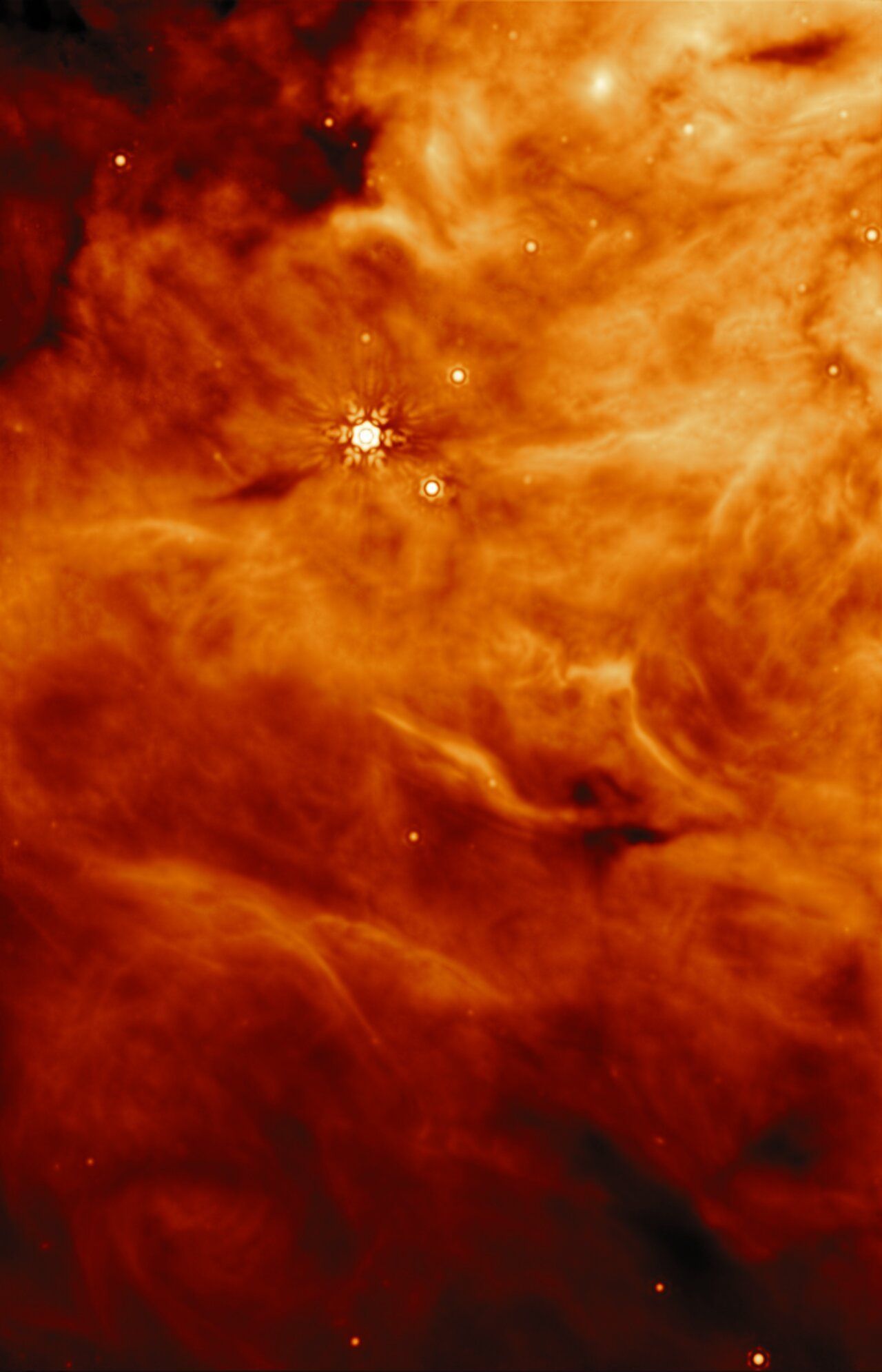 Orange and dark red nebula with bright star cluster at center.