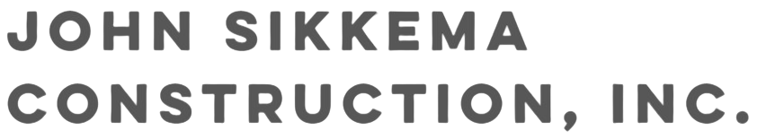 A logo for john sikkema construction inc. on a white background