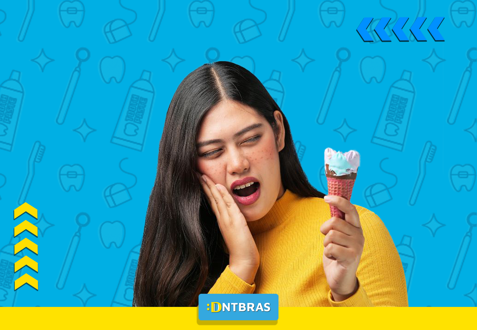Uma mulher está segurando uma casquinha de sorvete e com dor de dente.