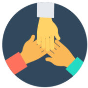 Three people are putting their hands together in a circle.