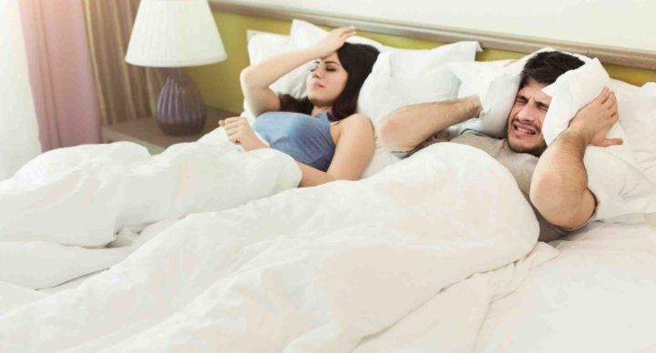 Annoyed couple because of noisy neighbours 