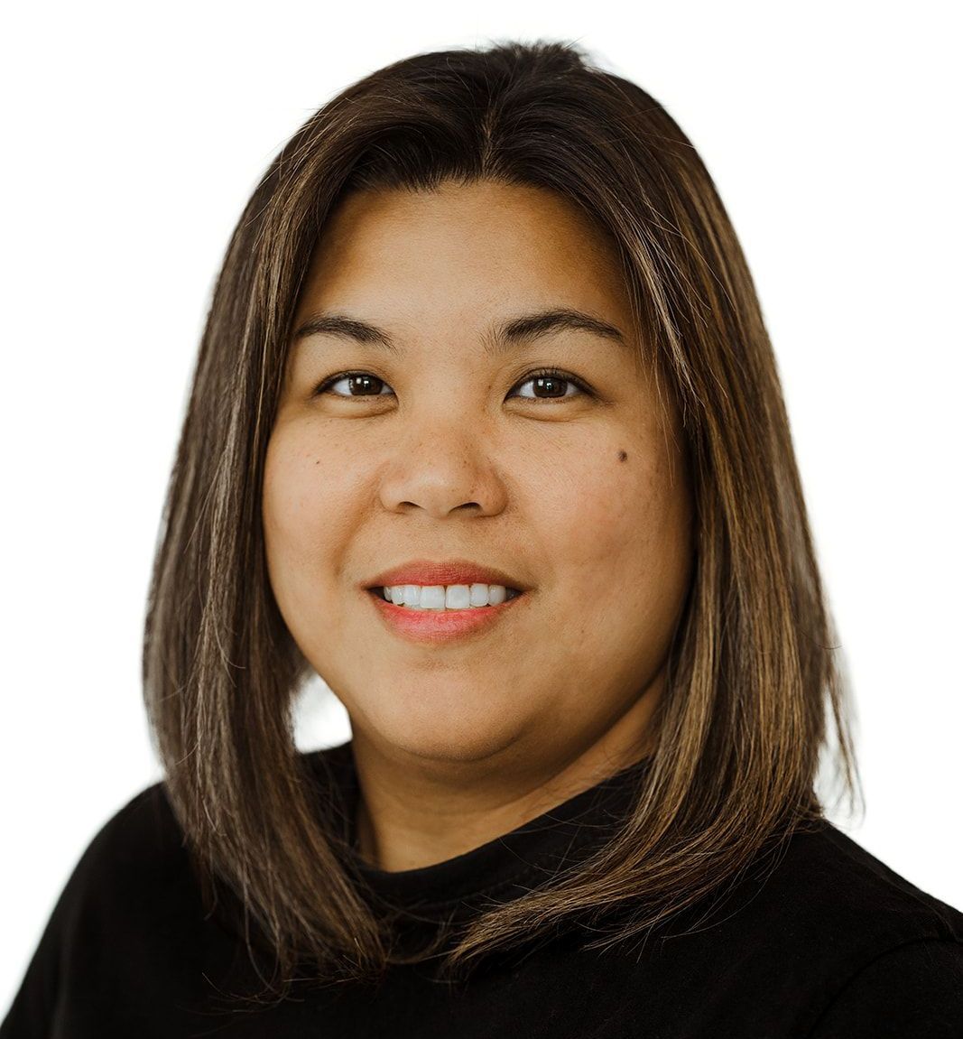 A close up of a woman 's face with a white background