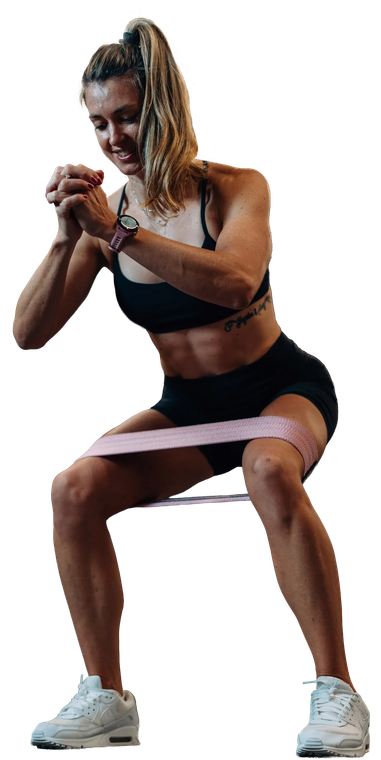 Woman doing a resistance-band squat workout in athletic wear against a white background