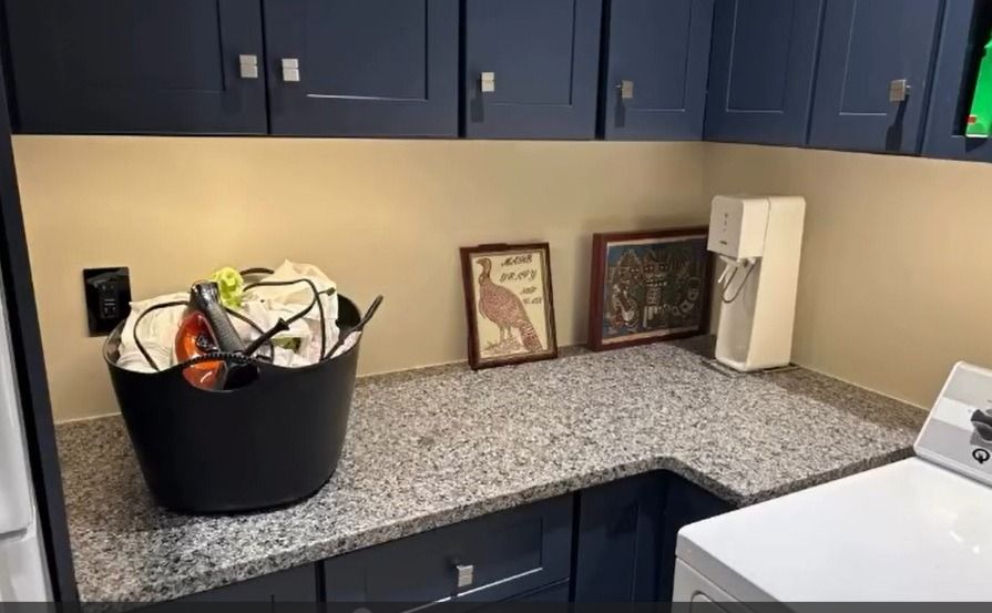 A custom stone bar or laundry room countertop installed by Ambiance Stone.