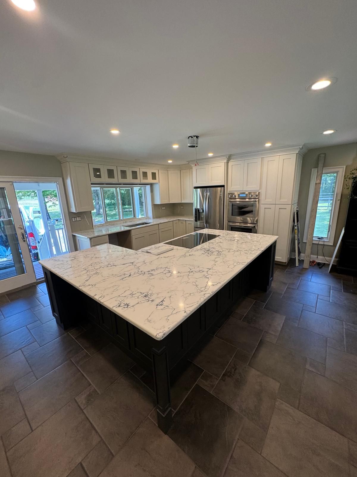 A beautiful new stone kitchen countertop installed by Ambiance Stone.