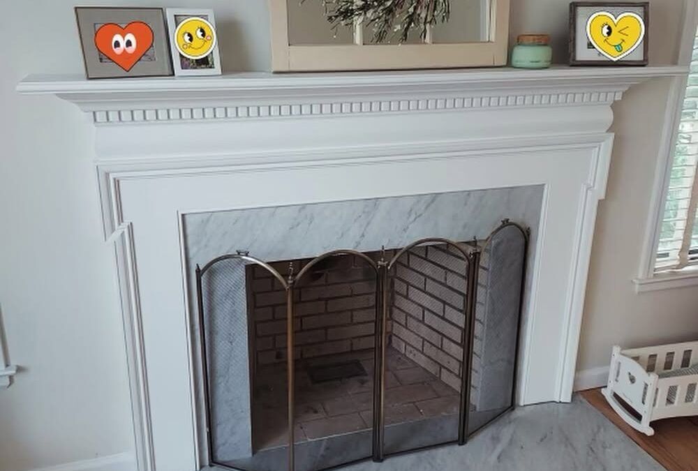 Marble and granite fireplace surround and mantel in Simsbury, CT by Ambiance Stone