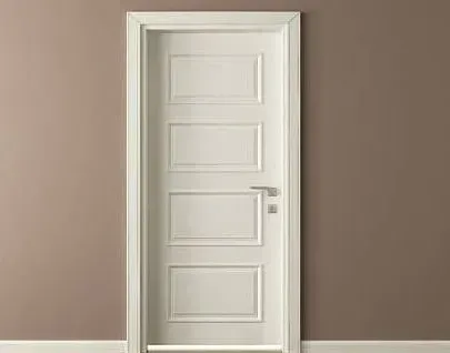 White, paneled interior door set in a tan wall. Silver handle.