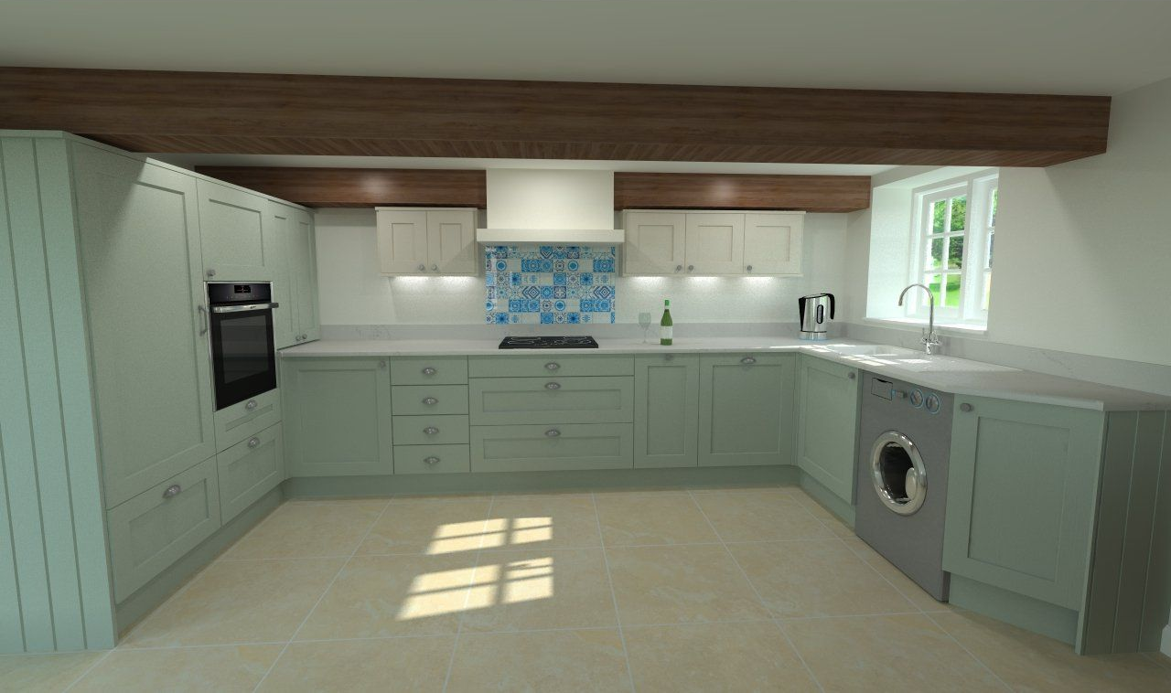 U-shaped kitchen with sage green cabinets, light countertops, and a mosaic backsplash. 