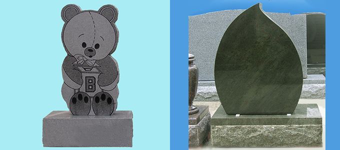 A teddy bear is sitting on a statue next to a gravestone.