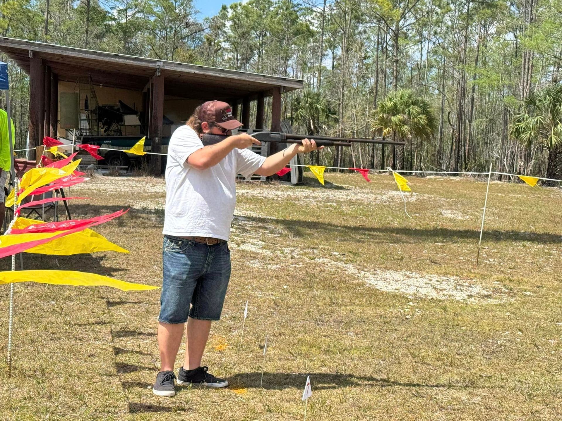 man shooting a gun