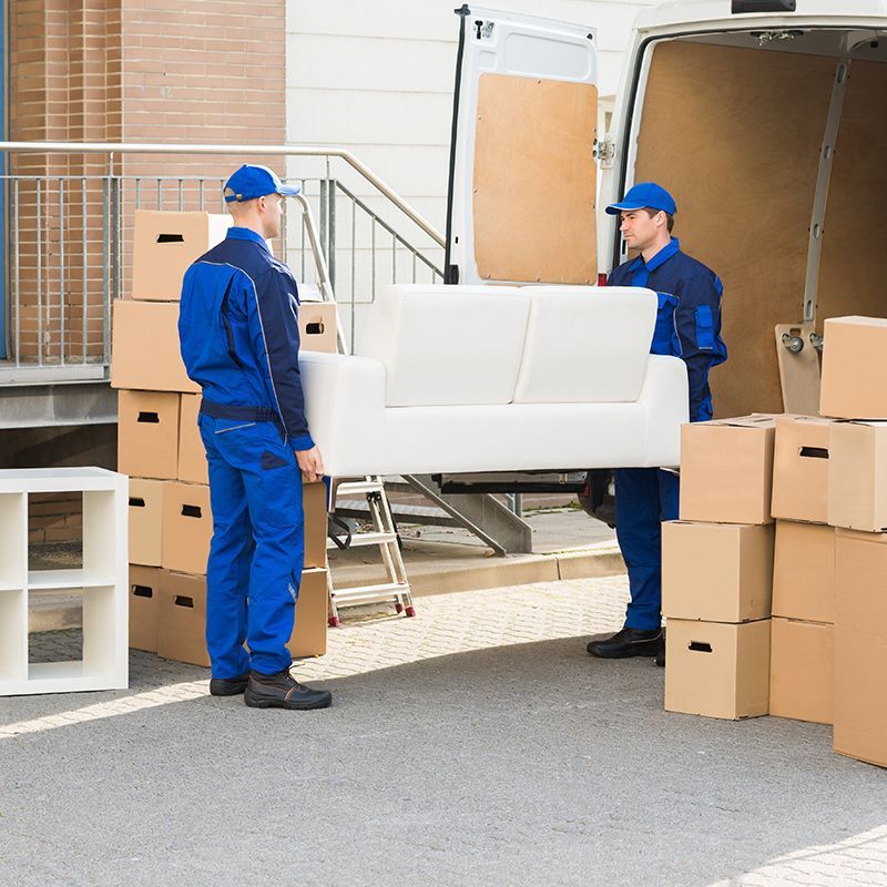 Workers Moving Out The Sofa