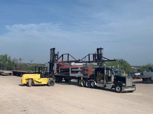 Forklift Getting Oversized Load Carrier Ready with Goods for International Transportation, Laredo, TX