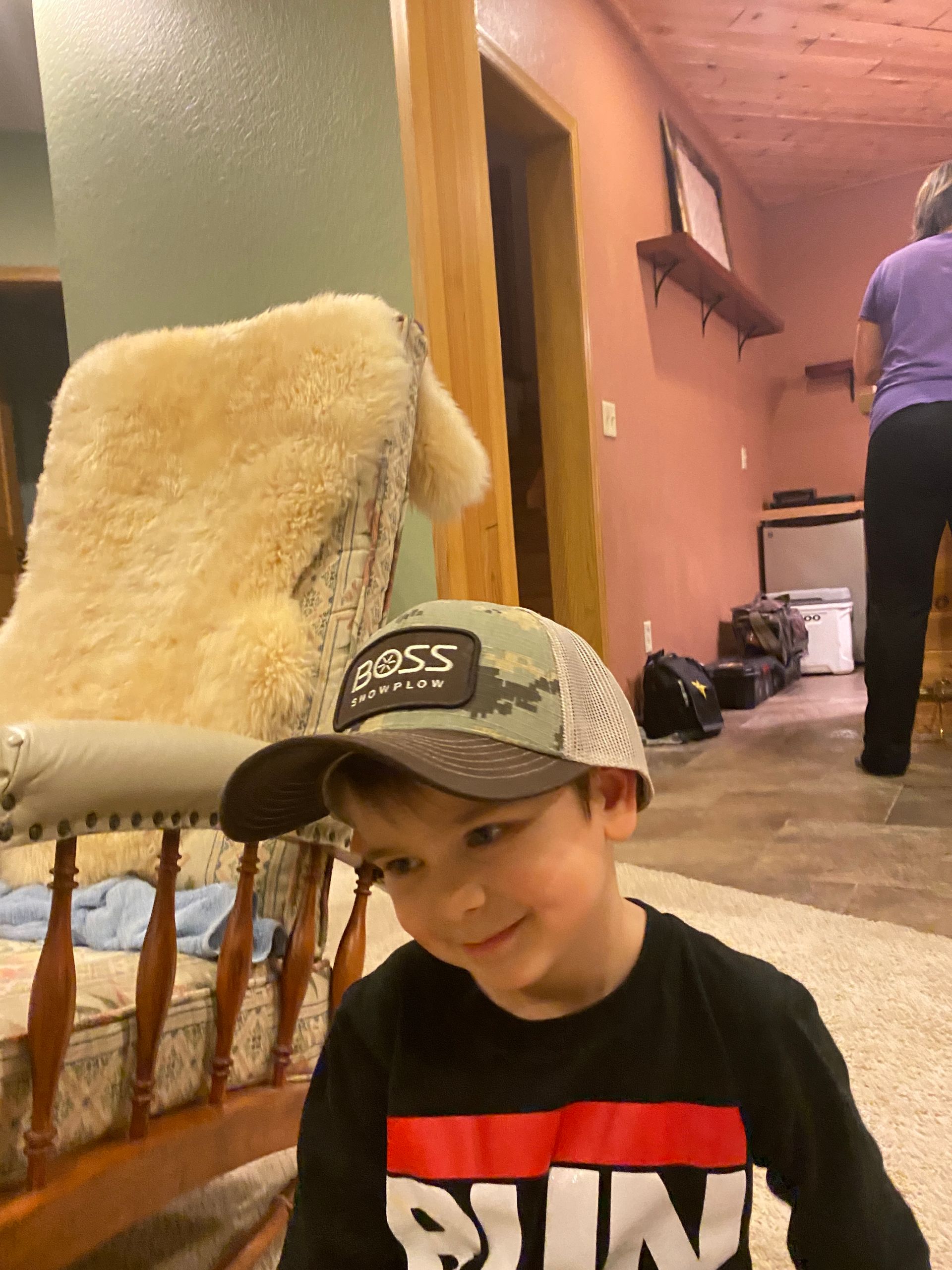 a boy in a room 

