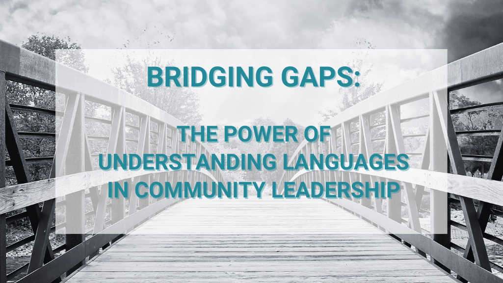 A bridge with the words bridging gaps the power of understanding languages in community leadership