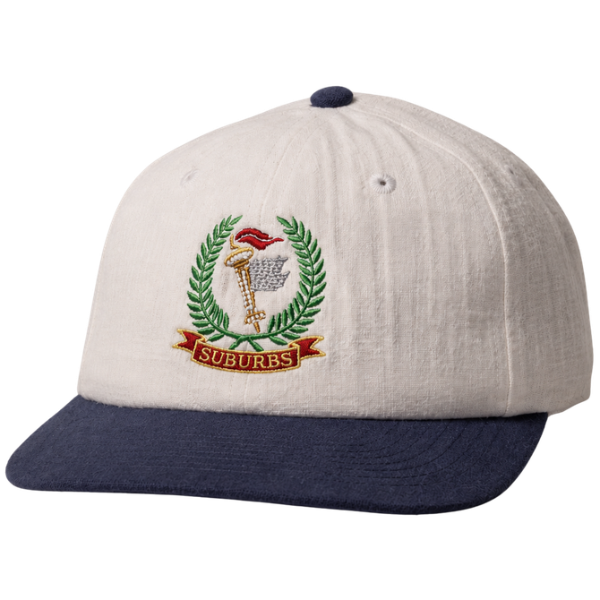 Beige baseball cap with navy brim and embroidered crest logo on the front