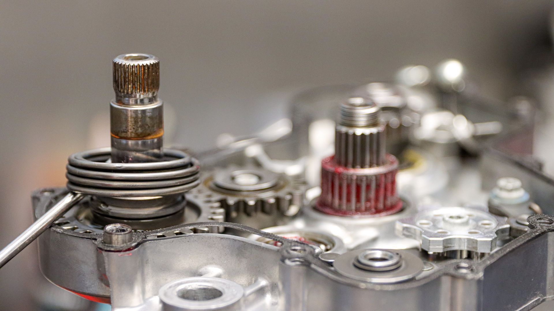a close up of a gearbox with a wrench in it .