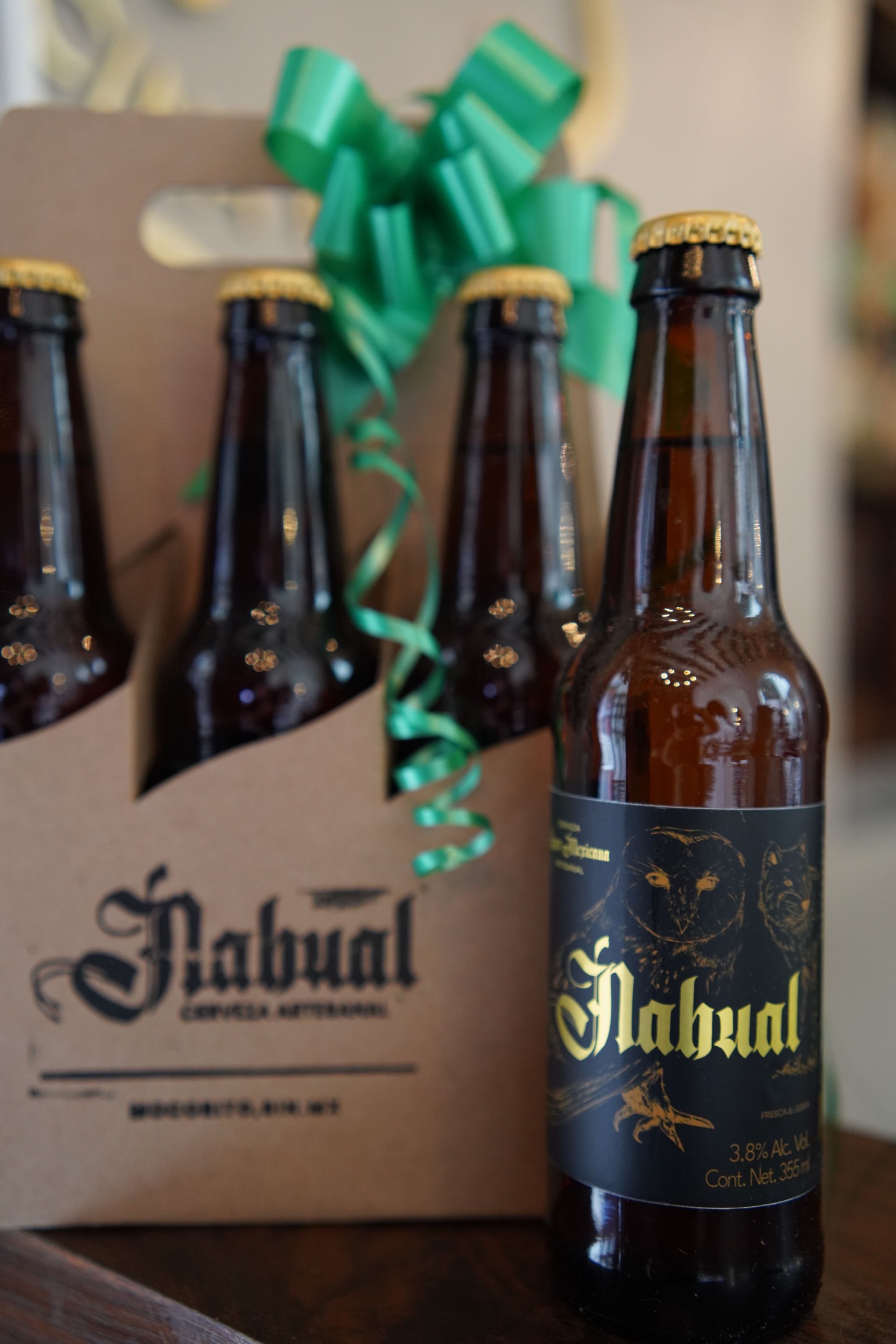 A six pack of bottles of labual beer