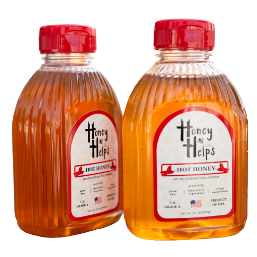 Two Honey Helps hot honey bottles isolated on white background with red caps for spicy infused honey display