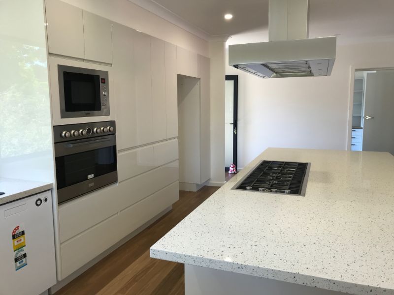 White Kitchen with Island Bench — Innovative Design in Salamander Bay, NSW