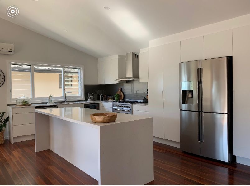Large Kitchen with Wooden Flooring — Innovative Design in Salamander Bay, NSW