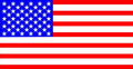 The american flag is red , white and blue with white stars.