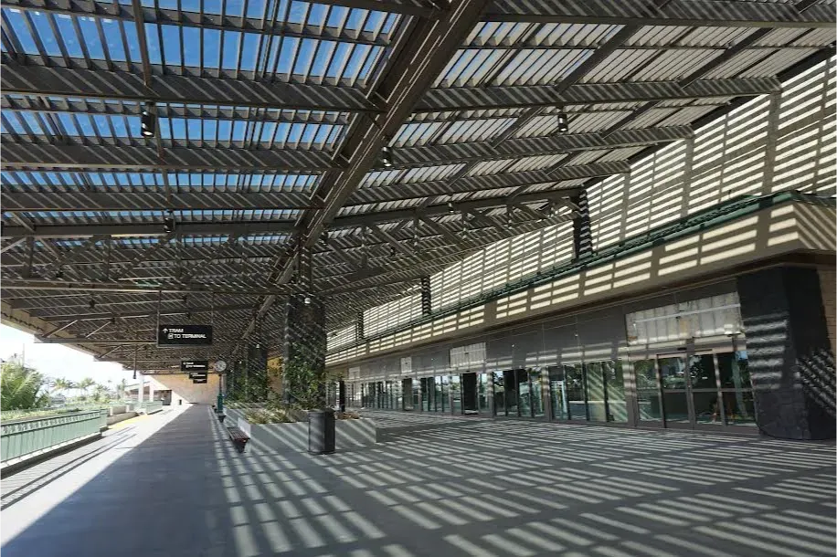 A train station with a canopy over the platform