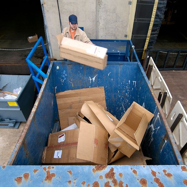 Recycling Cardboard Boxes — Anaheim, CA — Sunwest Metal, INC A container at a scrap metal recycling facility in Fullerton, CA