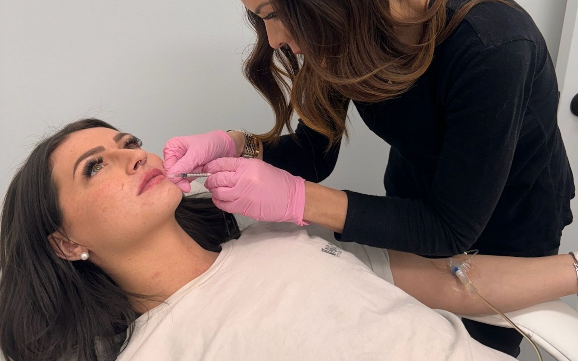 Mary is applying lip fillers