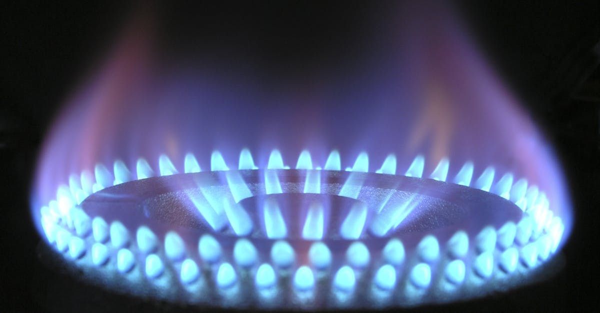 Blue gas burner flame during furnace operation for heating system inspection