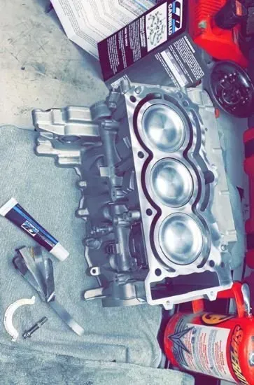 A close up of a cylinder block on a table