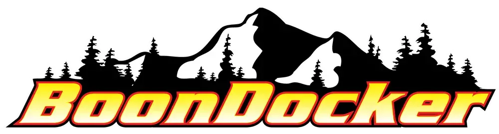 A logo for boondocker with a mountain and trees in the background