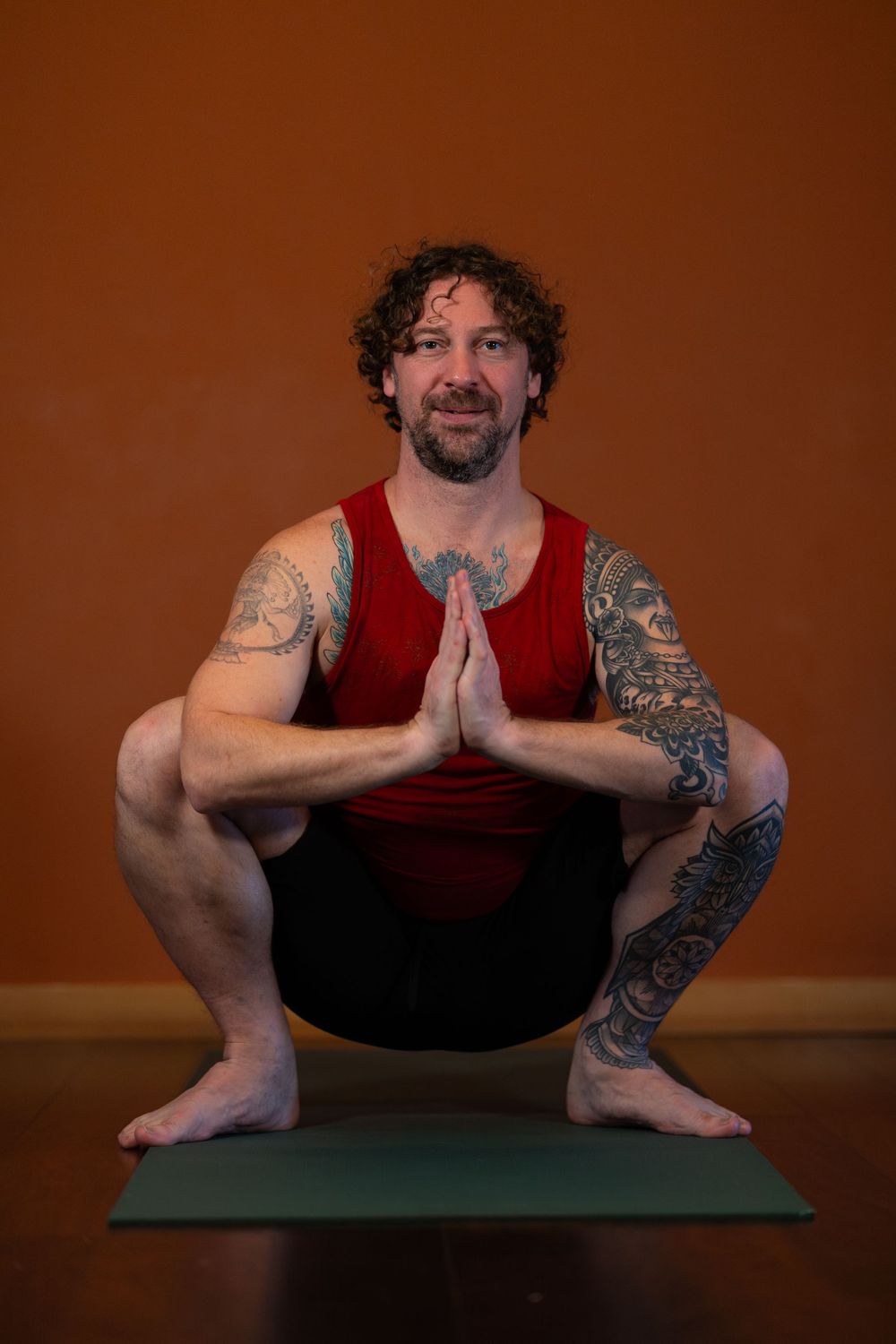 Jason Calsyn, founder, owner, and head instructor at Mystic Monkey Yoga