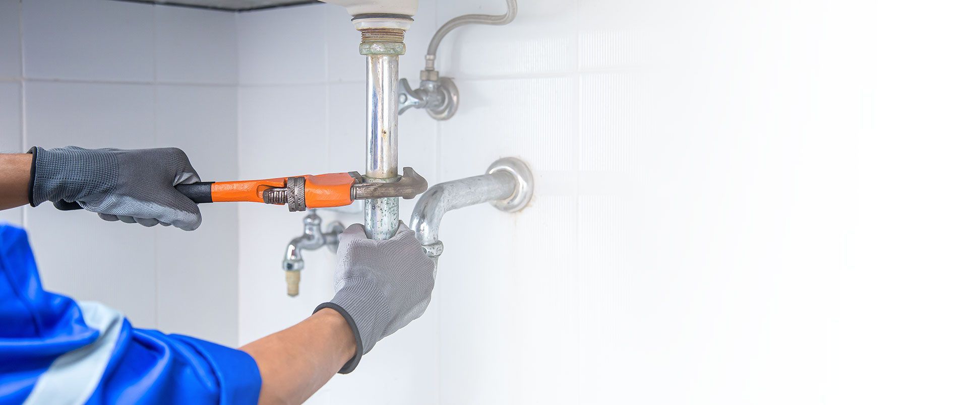 Local Plumber Performing Drain Cleaning Service