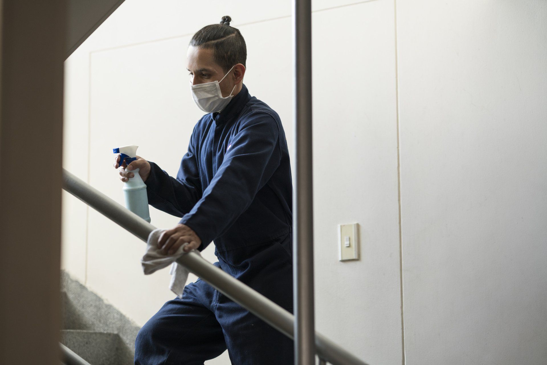 Man Wiping the Stairs - Northridge, CA - Executive Suite Services Man Wiping the Stairs - Northridge, CA - Executive Suite Services