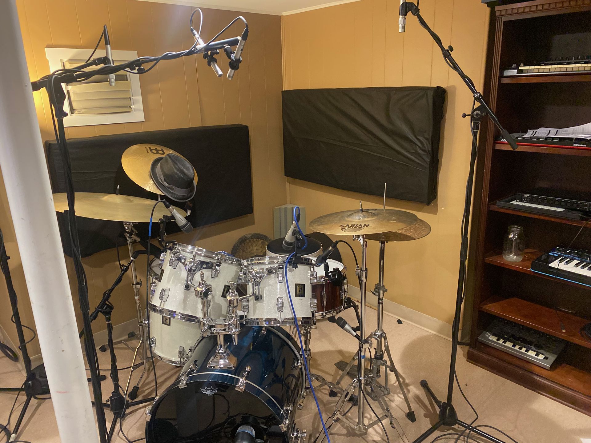 front view of a drum set in a practice room