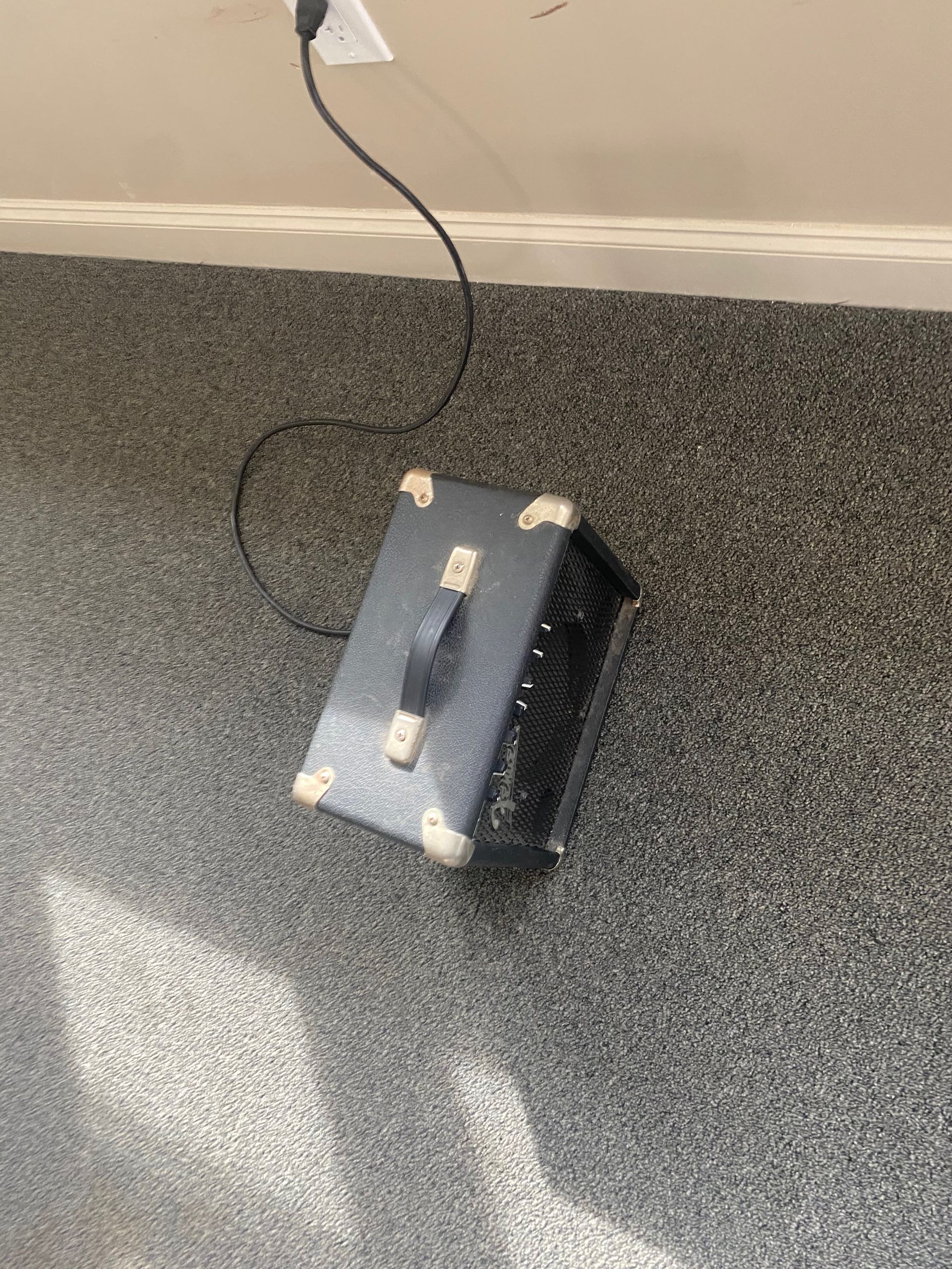 amplifier plugged into an outlet