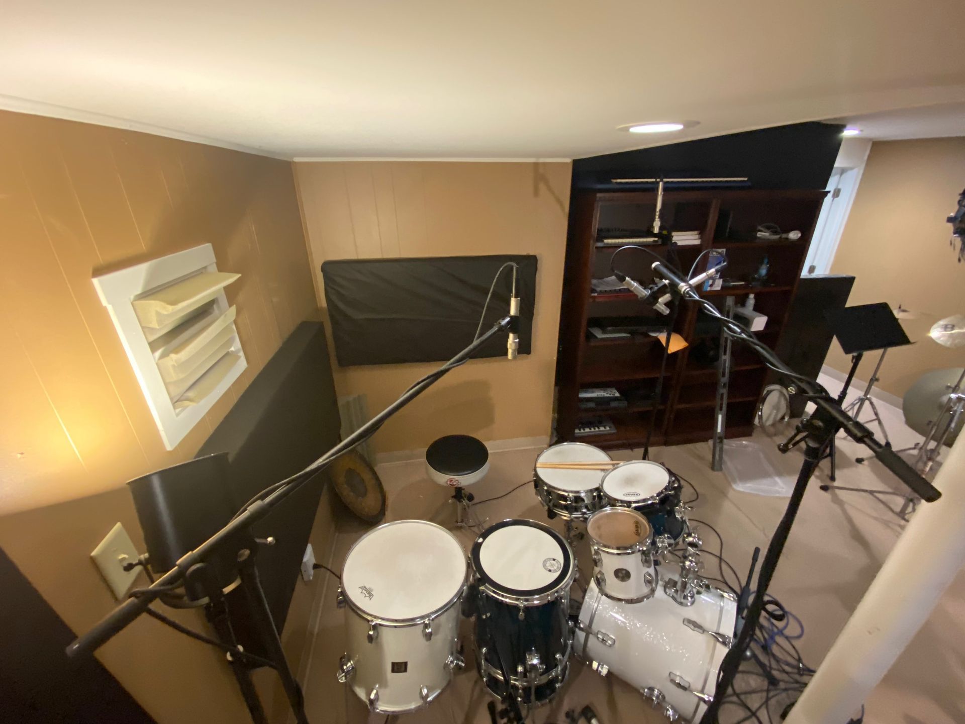 panoramic view of a practice room from the drum set