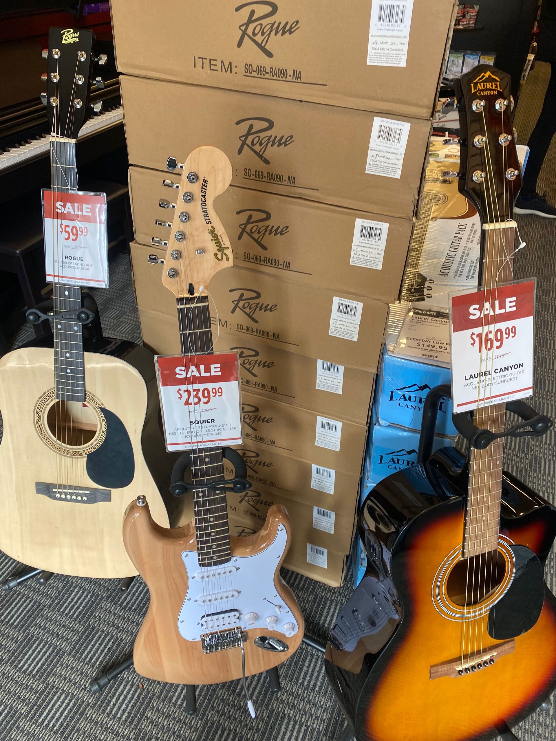 lots of guitars on sale