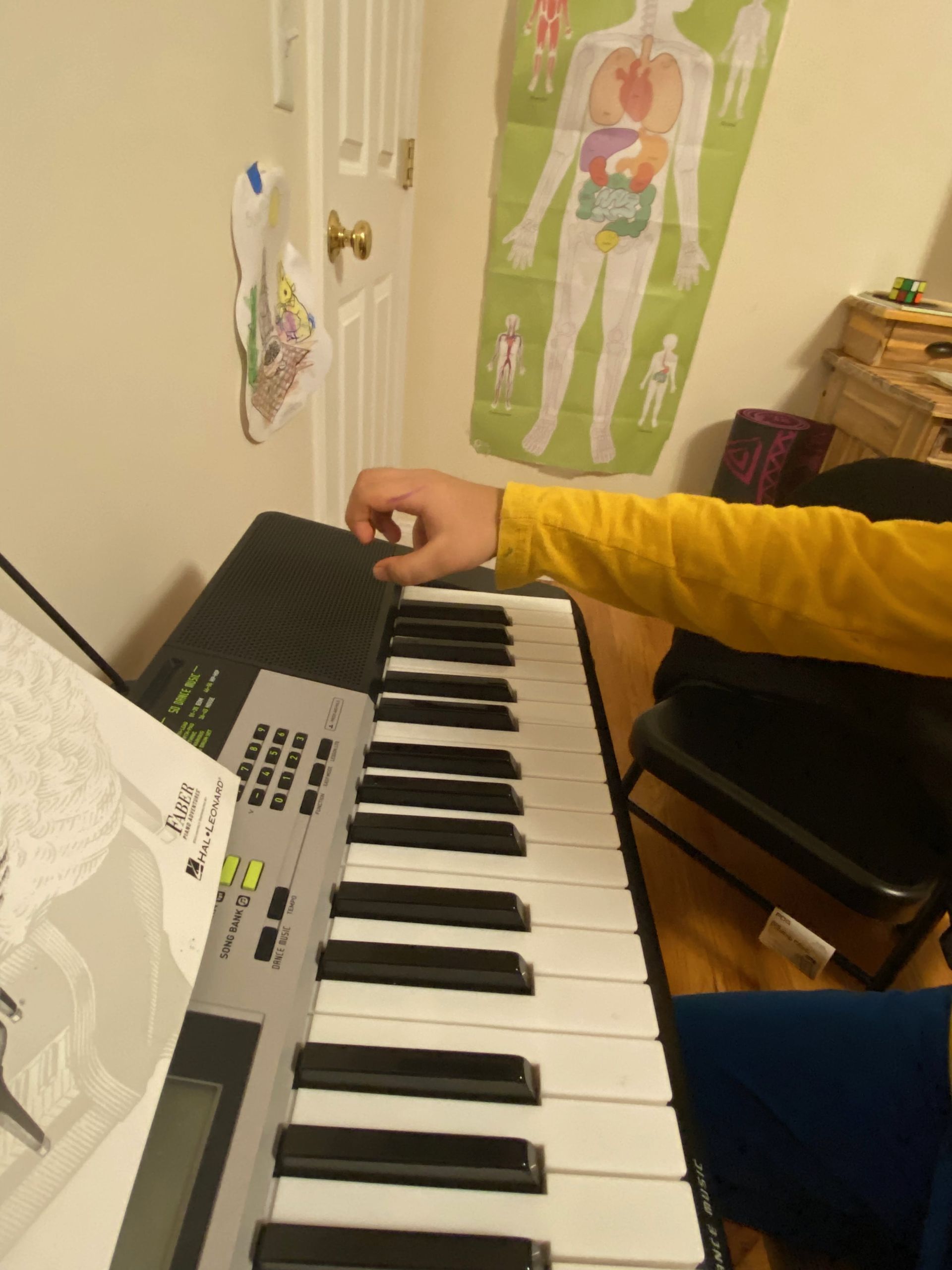 someone about to play the keyboard