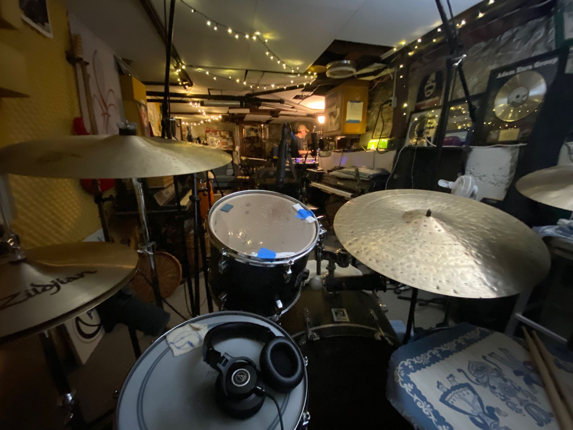 a drum set at a stuffy room